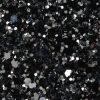 Glitter wallpaper encrusted with glitter pieces in a shade of black and silver from Glitter Bug Wallpaper.