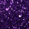 Glitter wallpaper encrusted with glitter pieces in a shade of purple from Glitter Bug Wallpaper.
