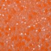 Glitter wallpaper encrusted with glitter pieces in a shade of orange from Glitter Bug Wallpaper.
