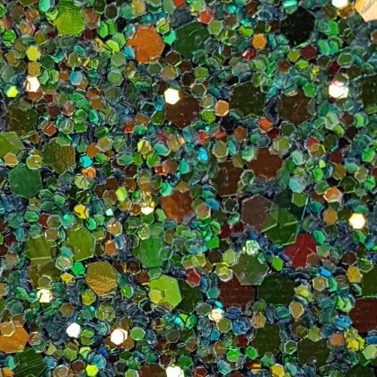 Glitter wallpaper encrusted with glitter pieces in a shade of black with iridescent particles from Glitter Bug Wallpaper.
