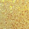 Glitter wallpaper encrusted with glitter pieces in a shade of yellow with iridescent particles from Glitter Bug Wallpaper.