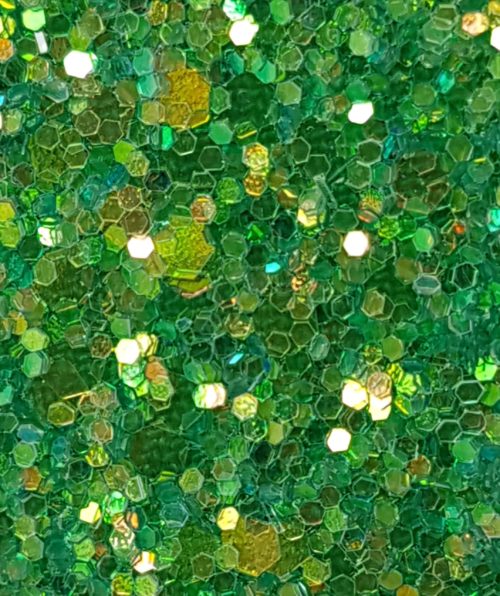 Glitter wallpaper encrusted with glitter pieces in a shade of green with iridescent particles from Glitter Bug Wallpaper.